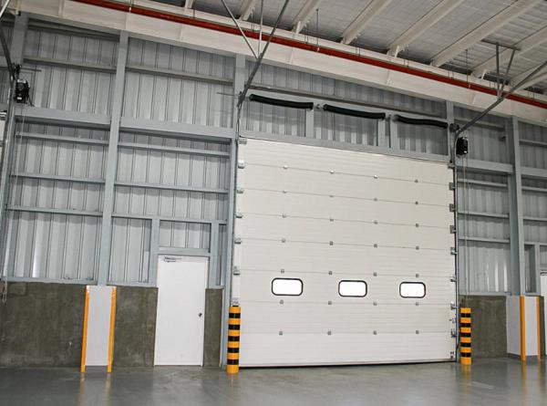Buy cheap Commercial Sectional Doors With 50mm-80mm Thickness Insulated Panels And Durable Steel Construction from wholesalers