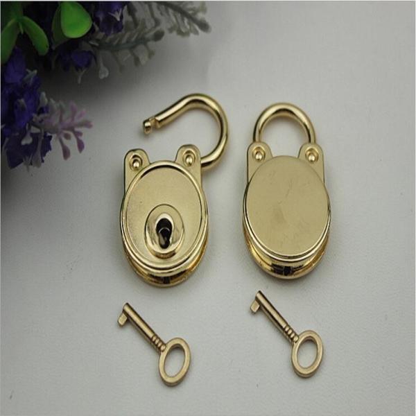 Buy cheap New style design bag metal accessories light gold oval shape hanging decorative padlock from wholesalers