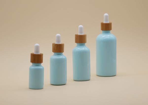 Buy cheap Free Samples Blue Color Essential Oil Glass Bottles With Bamboo Dropper from wholesalers