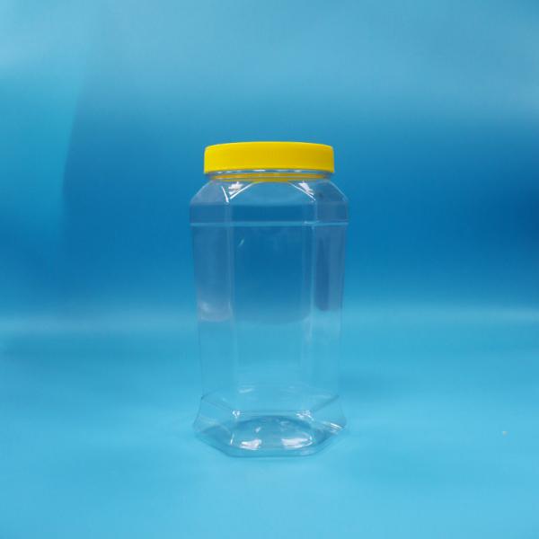 Buy cheap Food Grade Cookies Candy Hexagonal Shaped Clear PET Food Jar Yellow Screw Cap from wholesalers