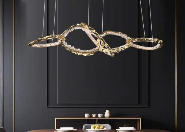 Buy cheap Light luxury copper ring staggered chandelier restaurant living room creative luxury decorative lamps from wholesalers