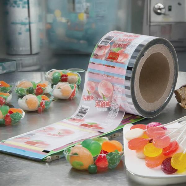 Buy cheap Custom Printing Sachet Packaging Roll Film Food Grade Pe Bopp Candy Lollipop Chocolate Food Auto-Packaging Roll Film from wholesalers