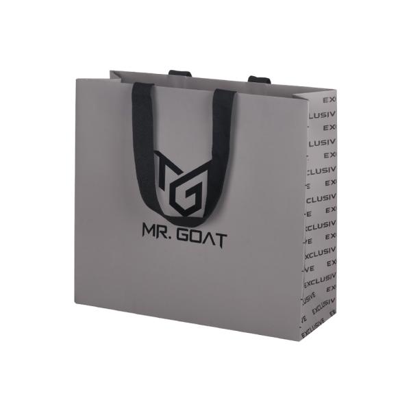 Buy cheap Grey UV Art Paper Gift Bags Clothing Shopping Packaging With Handle from wholesalers