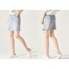 Buy cheap Light Color Asymmetric Hem Stretch Denim Ladies Denim Skirt With Rips Embroidery from wholesalers