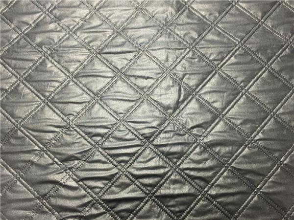 Buy cheap Wadded Clothes 1.2mm Quilted Bonded Leather Fabric With Polyester Cotton Surface Silver Color from wholesalers