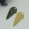 Buy cheap OEM zinc alloy light gold & gunmetal leaf pattern metal logo label tags for handbag/shoes accessories from wholesalers