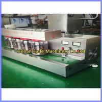 Buy cheap peanut butter glass bottle sealing machine, sesame paste bottler sealer product