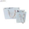 Buy cheap Biodegradable Ribbon Handle Shopping Bags Custom Printed Paper Glossy Lamination from wholesalers