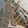 Buy cheap Clothing Stainless Steel Wall Display Racks Wall-mounted Hanger Gold Wall Mounted Clothes Rack for Clothes Shop from wholesalers