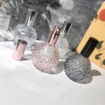 High Quality Customized Creative Design Embossed Ball Shape Glass Perfume Bottle