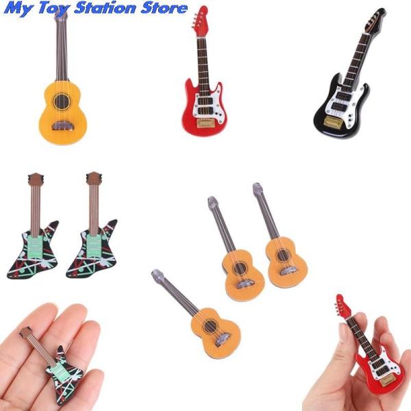 Buy cheap 1:12 Dollhouse Miniature Music Electric Guitar For Kids Musical Toy House Decor from wholesalers