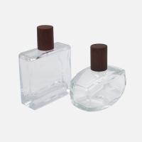 Buy cheap glass perfume spray 50ml 100ml perfume bottles with wooden caps product