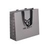 Buy cheap Grey UV Art Paper Gift Bags Clothing Shopping Packaging With Handle from wholesalers
