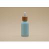 Buy cheap Color Coating Sky Blue 15ml 30ml Essential Oil Bottles With Bamboo Dropper from wholesalers
