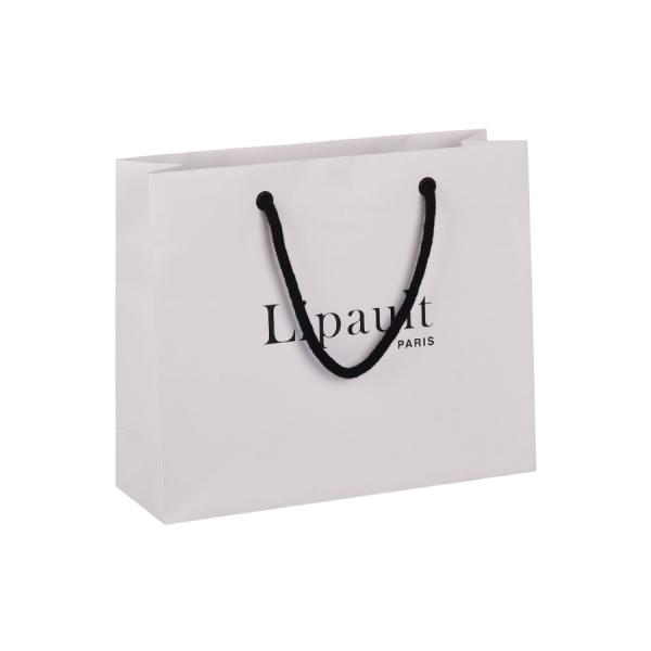 Buy cheap 6 X 4 X 10 Inches White Kraft Paper Bags 230gsm With Eyelet Punching Handle from wholesalers
