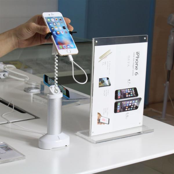 Buy cheap COMER clip stands gripper security alarm display charger holder anti theft display stand for mobile phone from wholesalers