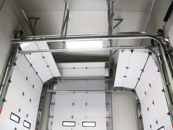 Buy cheap Commercial Sectional Overhead Doors Automatic Formed Industrial Sectional Doors Vertical from wholesalers