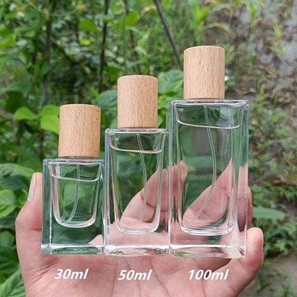 Buy cheap 30ml 50ml Perfume Spray Bottle Flat Round High End Wood Cap from wholesalers
