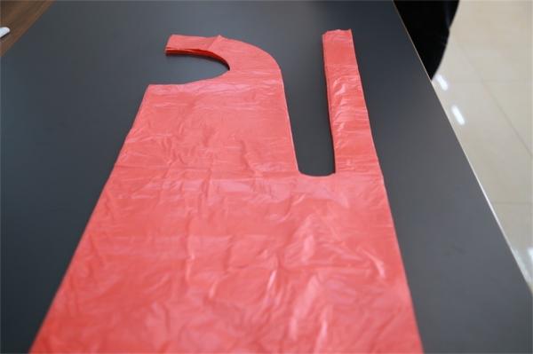 Buy cheap Red Waterproof Disposable PE Apron Medical / Food Industry Protection from wholesalers