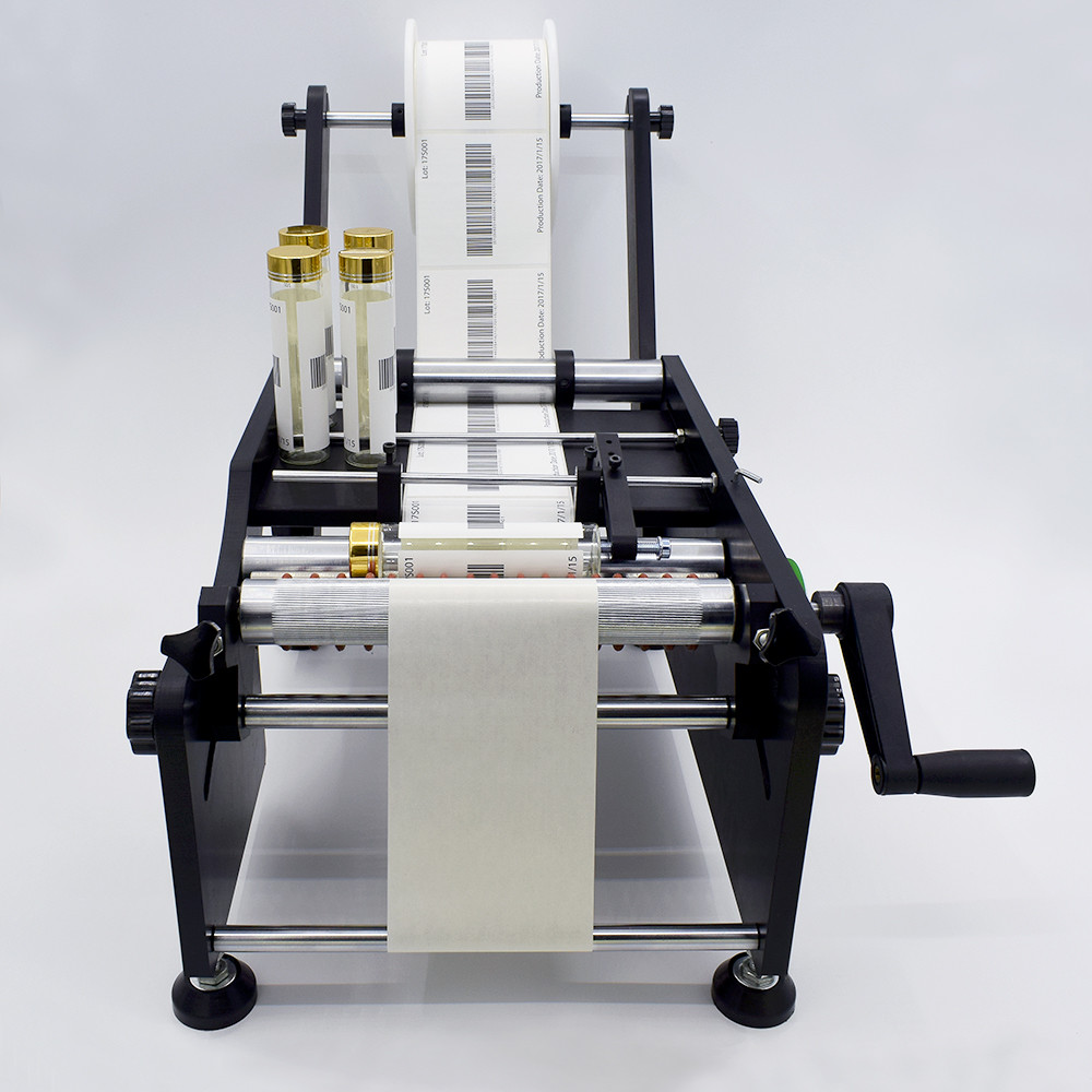 Semi-automatic labeling machine equipment for cylindrical products TB-26S