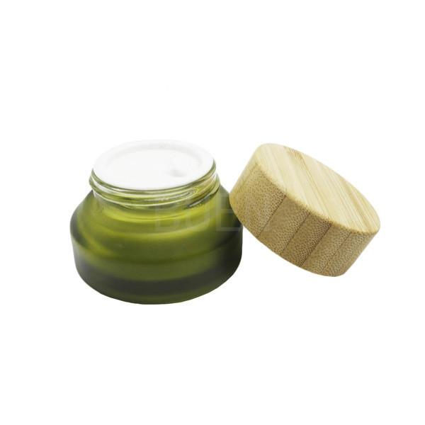 Buy cheap Blue Glass Cosmetic Jars For Moisturizer Inclined Shoulder With Bamboo Lid 5g from wholesalers