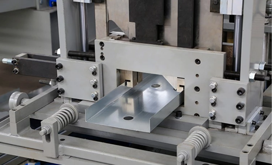 Shearing part of the stud and track