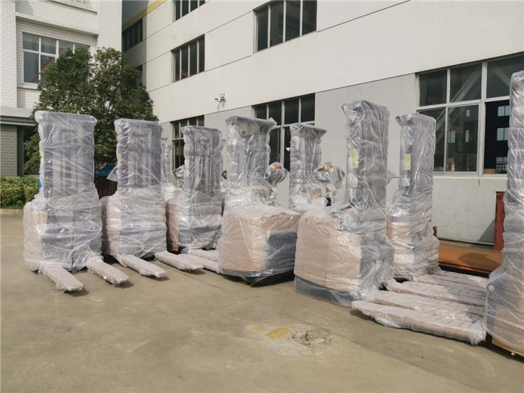 High quality red walkie type electrical forklift stacker 5.75 meter height paintl machine auto stacker