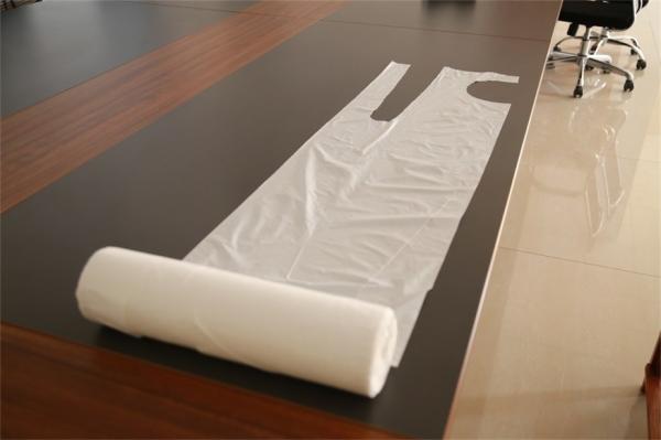 Buy cheap White Disposable PE Apron / Plastic Throw Away Aprons For Food Industry from wholesalers