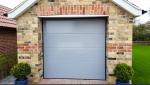 Fire Station Industrial Sectional Doors In White Colour And Automatic Formed