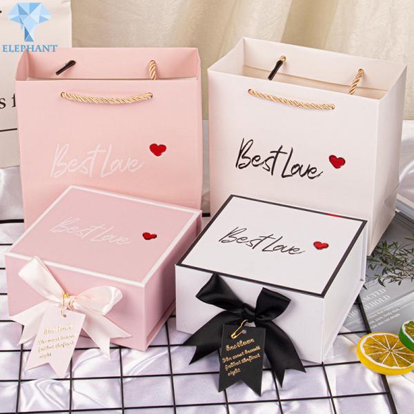 Buy cheap Luxury Wine Cosmetics Glossy Varnish Pink Magnetic Gift Box With Ribbon from wholesalers