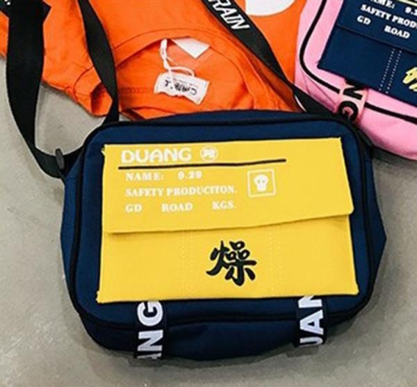 Buy cheap New men's and women's polyester waterproof shoulder bag slung personality street fashion bag from wholesalers