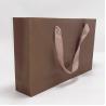 Buy cheap High End Kraft Paper Bag Printed Ribbon Handle Bags Carry Gift 31.5 X 6.4 X 19cm from wholesalers