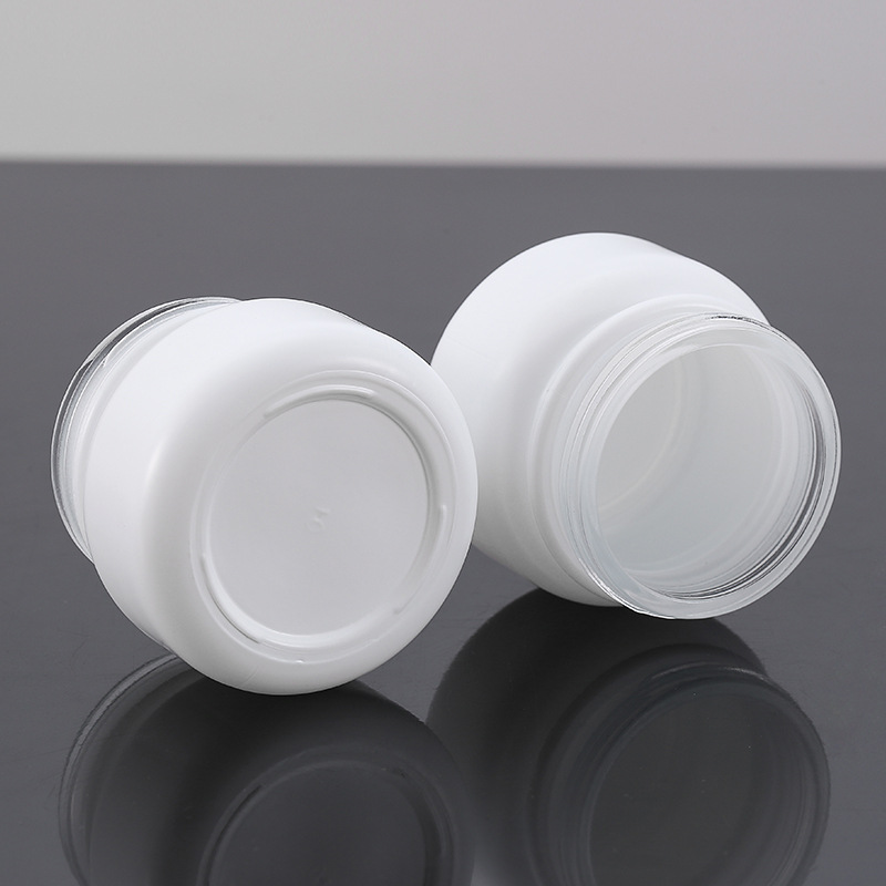 Stock Luxury Skin Care Glass Jar 50g Empty Frosted Cosmetic Packaging with Black Lid and Glass Bottle Plastic Cap White Disc