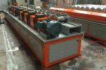 Garage door slat forming machine