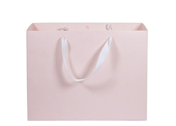 Buy cheap Eco - Friendly Paper Shopping Bags Pink Color With Twill Cotton Rope Handle from wholesalers