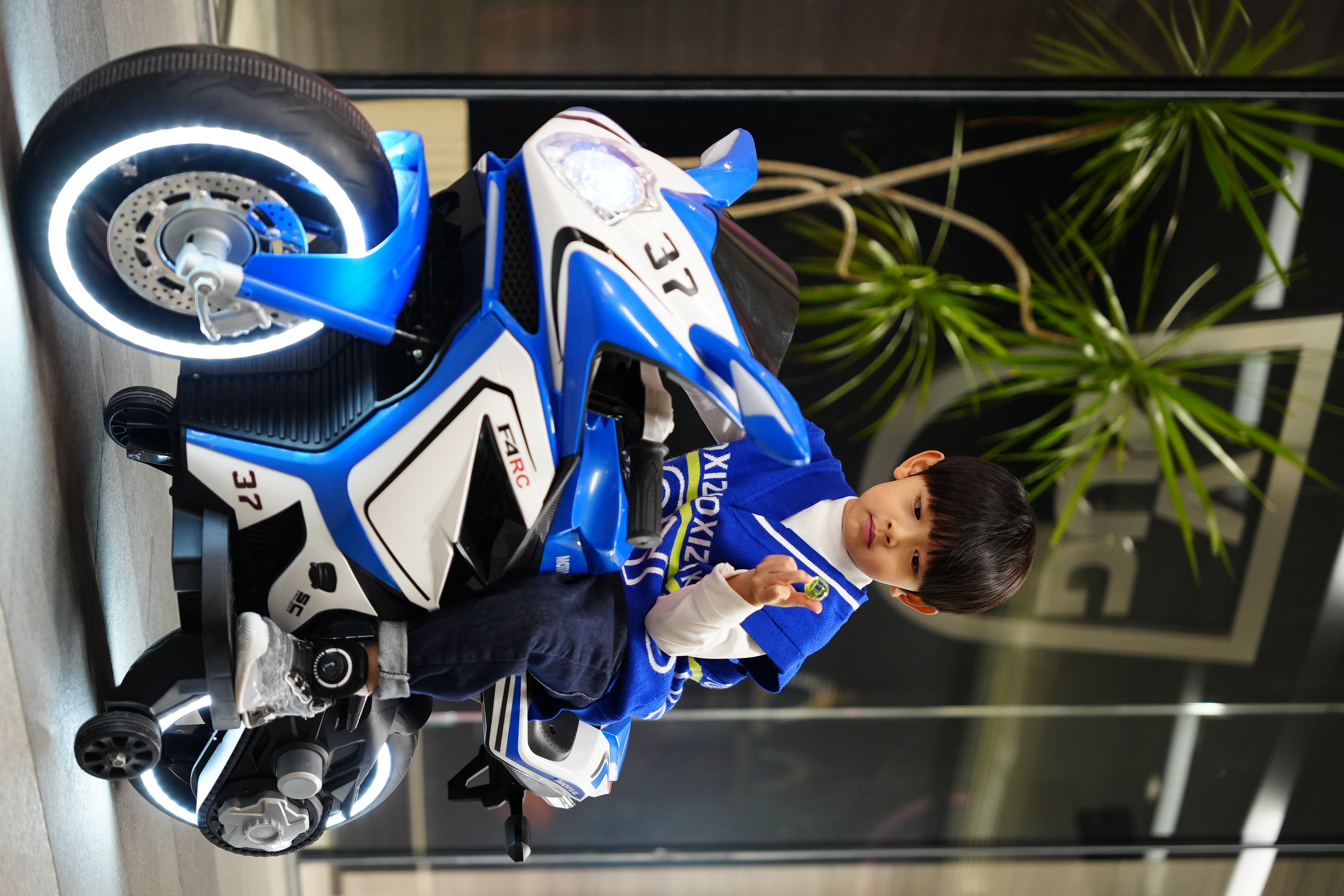 12V Electric Ride-On Motorcycle Car with Music and LED Lighting for Kids Manufactured