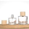 Buy cheap 30ml 50ml 100ml Round Frosted Clear Glass Perfume Bottle with Wooden Cap from wholesalers