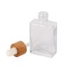 Buy cheap 30ml 50ml 100ml Square Clear Glass Dropper Bottle Eco Friendly Bamboo Essential Oil Bottle from wholesalers