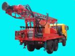 drilling rig for 3D seismic shothole in desert