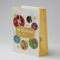 Buy cheap Pantone Printed Gift Paper Carrier Bags With Nylon Handles UV Coating product