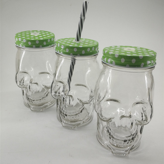 Popular products 17oz custom made glass skulls shaped 510ml mason jar with llid and straw