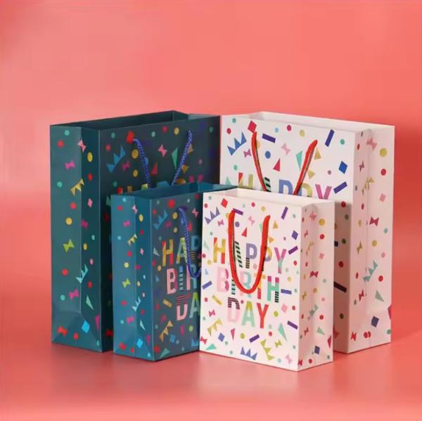 Buy cheap Customized Children's Holiday Party Paper Gift Bag Letter Pattern Large Birthday Paper Bag With Handle from wholesalers