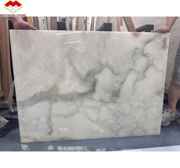 Buy cheap Gold and Blue Onyx Marble Stone for Hotel Floor Luxury Natural Stone Jade Slab Design from wholesalers