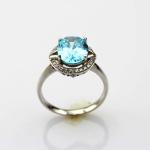 Sterling Silver 8mmx10mm Oval Blue Topaz Cubic Zircon Ring (R182)