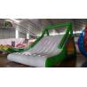 Buy cheap Green / White 0.9mm PVC Tarpaulin Blow Up Water Toy Floating Slide Rental Business use from wholesalers