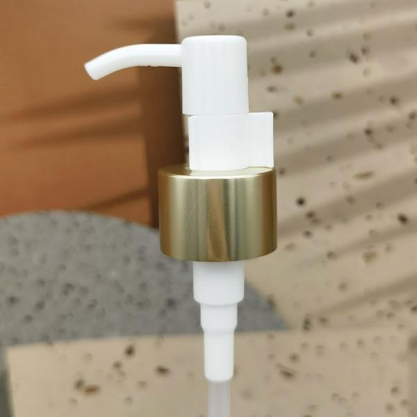 Buy cheap 24/410 Long Nozzle Plastic Cosmetic Lotion Pump Gold Aluminum Closure Metal Shell With Clip from wholesalers