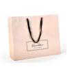 Buy cheap Flat Cotton Handle Custom Design Paper Bags , Printed Paper Shopping Bags Pink Color from wholesalers