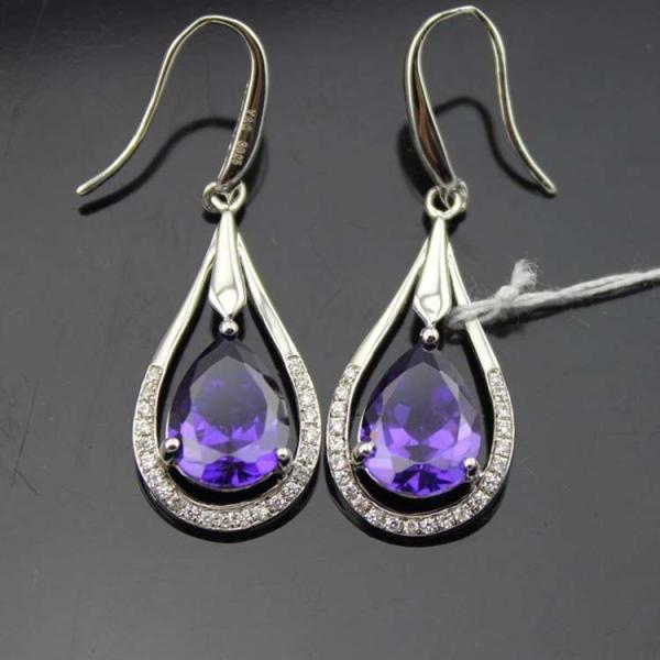 White Gold Plated 925 Silver 7x9mm Oval Amethyst Cubic Zirconia Earrings