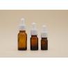 Buy cheap Amber Empty Essential Oil Bottles Color Coating White Ceramic Dropper Bottle from wholesalers