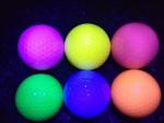 fluorescent golf ball , golf balls , fluorescent golf balls in black light (glow